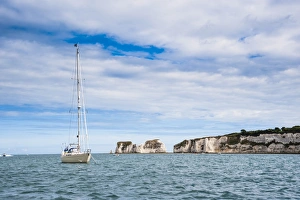 Sailing boat at Old Harry Rocks, between Swanage and Purbeck, Dorset, Jurassic Coast, UNESCO World Heritage Site, England, United Kingdom, Europe Sailing boat at Old Harry Rocks, between Swanage and Purbeck, Dorset, Jurassic Coast, UNESCO World Heritage Site, England, United Kingdom, Europe