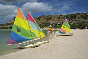 Leeward Island Prints: Sailing boats on the beach at the St