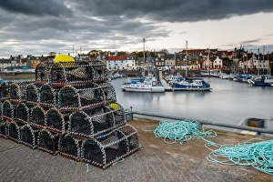 Stacked Prints: Sailing boats and crab pots at dusk in the harbour at Anstruther, Fife, East Neuk