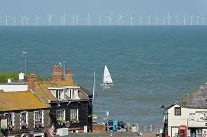 Kent Prints: Sailing dinghy passes Broadstairs with Thanet Windfarm in background