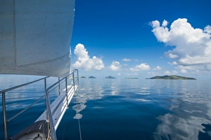 Sailing in the very flat waters of the Mamanuca Islands, Fiji, South Pacific