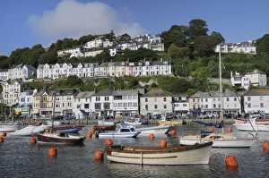Sailing yachts and fishing boats moored in Looe harbour, Cornwall, England, United Kingdom, Europe