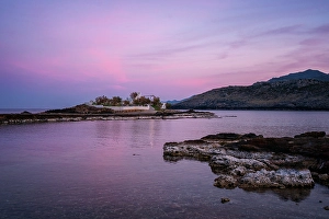 Peloponnese Prints: Saint Fokas Orthodox chapel on the coast of Greece at sunset, Peloponnese, Greece