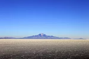 Images Dated 2nd November 2010: Salar de Uyuni salt flat and Mount Tunupa, Andes mountains in the distance in south-western