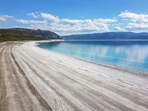 Days Prints: Salda lake view from above shows white sand and blue water under a clear sky in Turkey during a sunny day