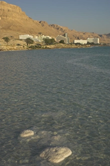 Seasoning Prints: Salt blocks in the sea and hotels in background