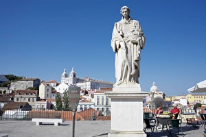 San Vincente de Fora statue and view of Alfama district