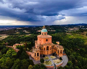 Bologna Prints: Sanctuary of Madonna di St. Luca, the symbol of Bologna, at sunset during a storm