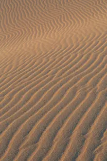 Barren Prints: Sand textures on the dramatic Dunas de Corralejo in evening light on the volcanic