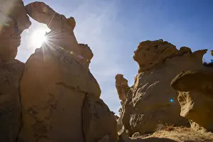 Sunbeam Prints: Sandstone sculptures and sun flare in Bisti / De-Na-Zin Wilderness in New Mexico