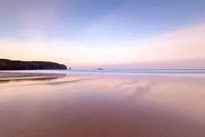 Sandwood Bay at sunrise, with Am Buachaille sea stack in far distance, Sutherland