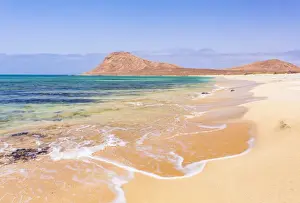 Cape Verde Prints: Empty sandy beach and bay near Monte Leao mountain (Sleeping Lion mountain), Sal Island
