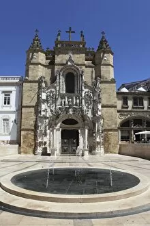 Images Dated 18th July 2010: The Santa Cruz church, with Manueline facade, on the Praca 8 de Maio square
