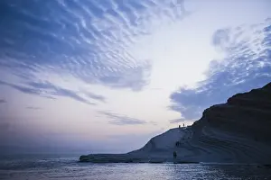 Realmonte Prints: Scala dei Turchi, clouds reflecting the shape of The Turkish Staircase at sunset