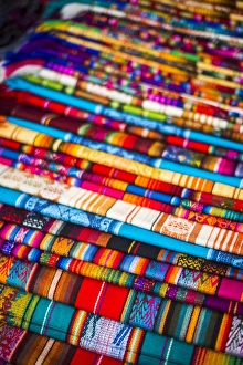 Stripe Prints: Scarves for sale in Otavalo Market, Imbabura Province, Ecuador, South America