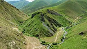 Fresh Prints: Scenery and terrain around Istisu featuring hills and a winding river in Qarabaqh region of Azerbaijan