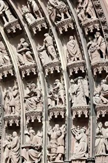 Alsace Prints: Scenes from the Old and New Testaments on the arches of the western front of Our Lady of