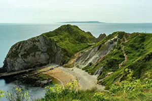 Natural Arch Prints: Scenic view of a coastal landscape with cliffs