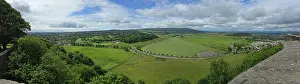 Stirling Prints: Scenic view of countryside around Stirling Castle with green fields and hills under cloudy sky