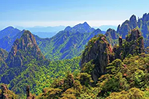 Range Prints: Scenic view of Huangshan mountains with lush greenery under clear blue sky in Anhui Province China