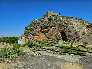 Infrastructure Prints: Scenic view of Khyber Pass showing a mountain, old ruins, and railway tracks in Pakistan