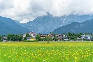 Salzburg Prints: Scenic view of landscape with mountains and fields during sunny day near Saalfelden