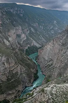 National Prints: Scenic view of a river flowing through rugged mountains in Dagestan region of Russia