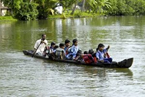 School children in a local boat, Alleppey, Kerala, India, Asia