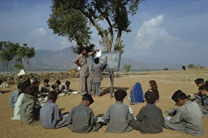 Teacher Prints: Two school girls separated from the boys at a village
