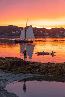 Young Man Prints: A schooner returns to dock at sunset at Bailey Island, Casco Bay, Maine