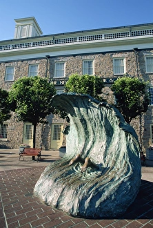 Humor Prints: Sculpture depicting someone diving into a wave