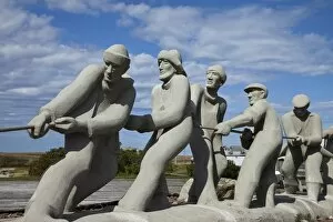 Images Dated 20th September 2009: Sculpture of fishermen on island in the Gulf of St. Lawrence, Iles de la Madeleine