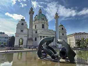 Creativity Prints: Sculpture by Henry Moore stands in front of Karlskirche in Karlsplatz