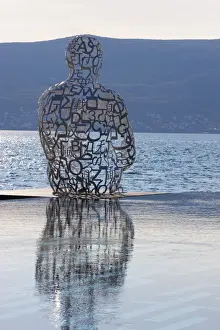 Letters Prints: Sculpture of a man made of letters at the Lido Mar swimming pool at the newly developed Marina in Porto Montenegro