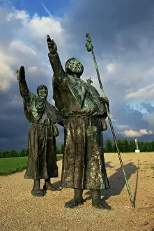 Sculpture of pilgrims hailing their goal at the end of the Camino, Monte del Gozo