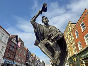 Creativity Prints: Sculpture of Surrey Scholar on High Street in Guildford captures a moment of learning and youth in the heart of town