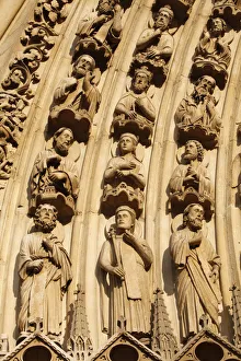 Stereotypically French Prints: Detail of sculptures on arch of the Western facade, Notre Dame cathedral, Paris, France