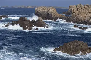 Ushant Prints: Sea pounding rocks on the coast on the Cote Sauvage on Ouessant Island