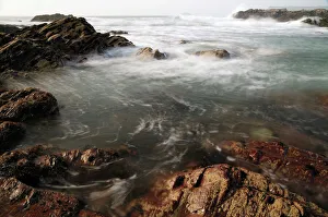 Stormy Prints: Sea swirling around rocks, near Polzeath, Cornwall, England, United Kingdom, Europe