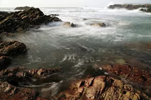 Images Dated 2nd April 2009: Sea swirling around rocks, near Polzeath, Cornwall, England, United Kingdom, Europe