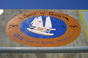 Porto Santo Prints: Sea wall at port decorated with pictorial souvenirs of boats visit
