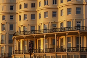 Brighton Prints: Seafront facade bathed in dusk light, Brighton, Sussex, England, United Kingdom, Europe