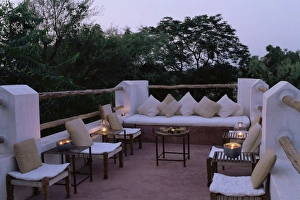 Seating area on the roof terrace of an old farm house