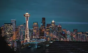 Office Buildings Prints: Seattle city skyline at night with urban office buildings and Space Needle viewed