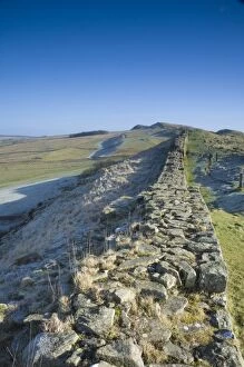 Northumbria Collection: A section of the Wall along the top of Cawfields Crags looking east to Sewingshields Crags