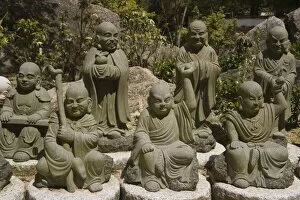 Selection from an army of 500 similar small Buddhas at Daishoin temple