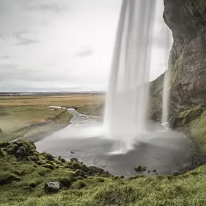 Sudurland Prints: Behind Seljalandsfoss, a famous waterfall just off route 1 in South Iceland (Sudurland)