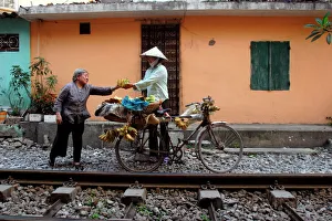 Bicycle Prints: Selling bananas by the railway tracks in central Hanoi