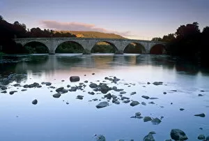 Images Dated 7th January 2000: The seven-arched Dunkeld Bridge over the River Tay at dusk