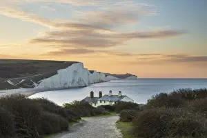 Cottage Prints: Seven Sisters and Beachy Head with coastguard cottages at sunrise in spring, Seaford Head